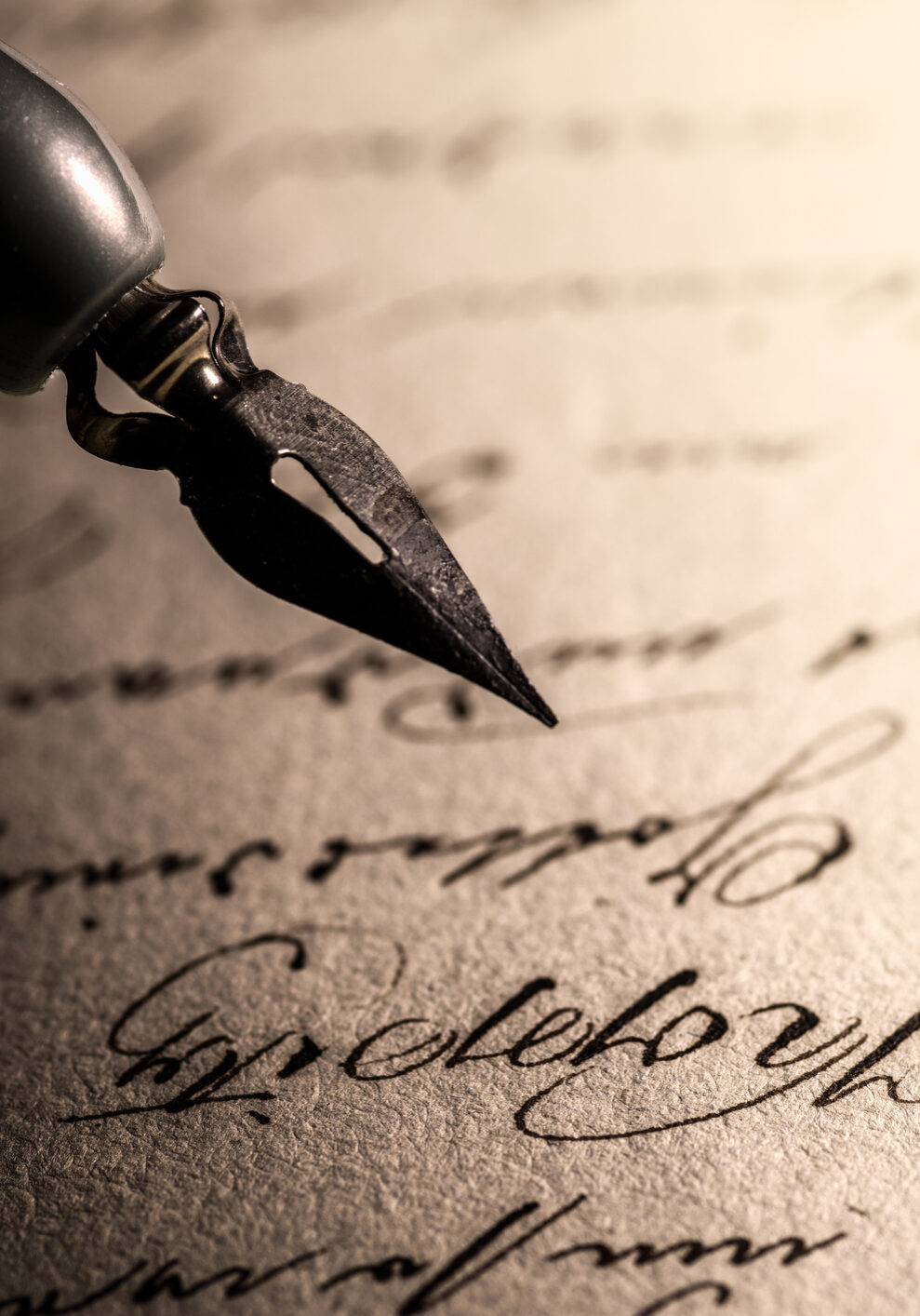 An old pen over the old manuscript, old writing, archival materials, old letter, handwriting,